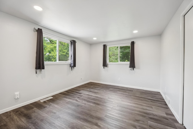 2362 Georgetown Blvd, Ann Arbor, MI 48105 - spare room featuring dark wood-style floors and recessed lighting