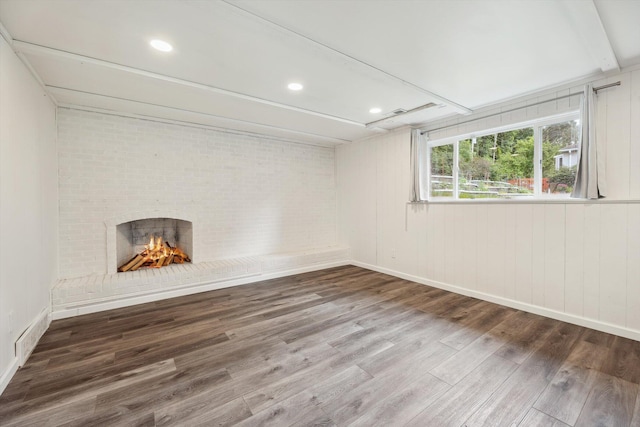 2362 Georgetown Blvd, Ann Arbor, MI 48105 - unfurnished room featuring wood finished floors, a fireplace, and recessed lighting