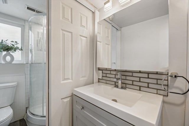 2362 Georgetown Blvd, Ann Arbor, MI 48105 - full bath featuring vanity, a shower stall, and backsplash