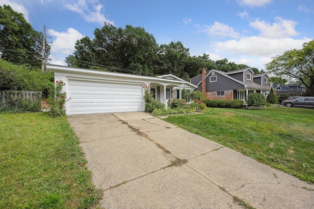2362 Georgetown Blvd, Ann Arbor, MI 48105 - view of front facade featuring a porch, concrete driveway, and an attached garage