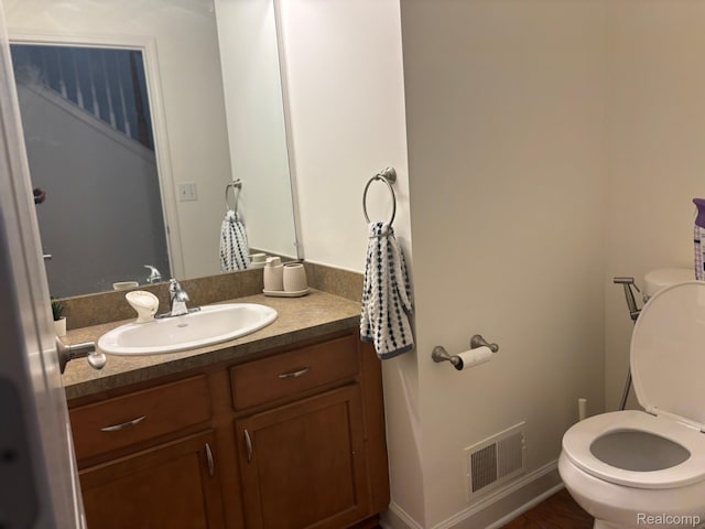 44700 Heather Ln, Canton, MI 48187 - bathroom featuring vanity and toilet
