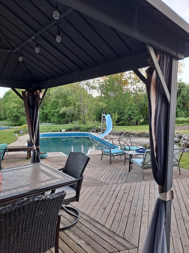 4295 S Gordon Ave, Fremont, MI 49412 - wooden deck with an outdoor pool