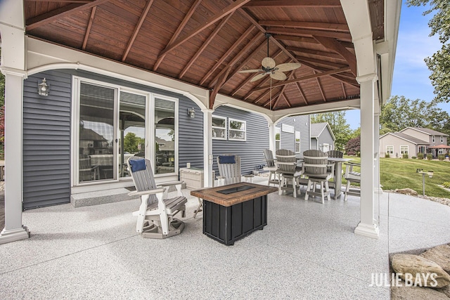 12828 Bayou Ct, Wayland, MI 49348 - view of patio / terrace with a gazebo, ceiling fan, a fire pit, and outdoor dining area