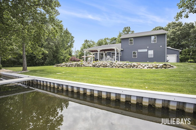12828 Bayou Ct, Wayland, MI 49348 - rear view of house featuring a lawn