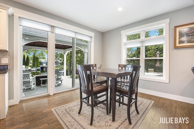 12828 Bayou Ct, Wayland, MI 49348 - dining area featuring recessed lighting and wood finished floors