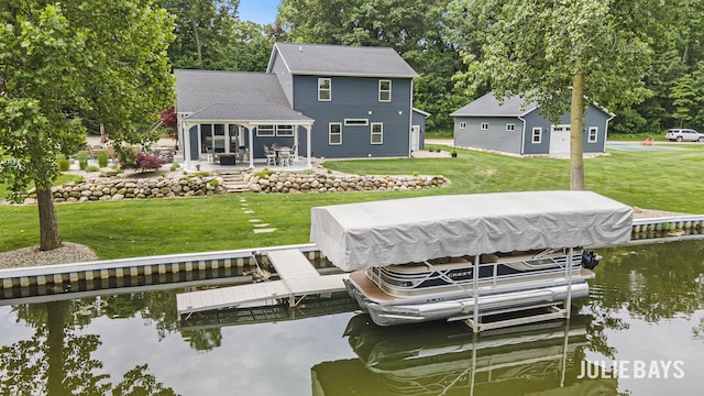 12828 Bayou Ct, Wayland, MI 49348 - dock area with a water view, a patio, a lawn, and boat lift