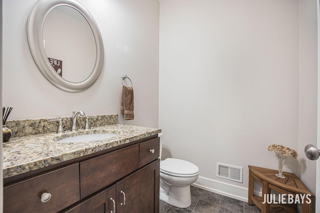12828 Bayou Ct, Wayland, MI 49348 - half bathroom featuring baseboards and vanity