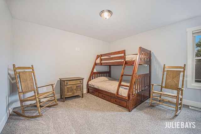12828 Bayou Ct, Wayland, MI 49348 - carpeted bedroom with baseboards
