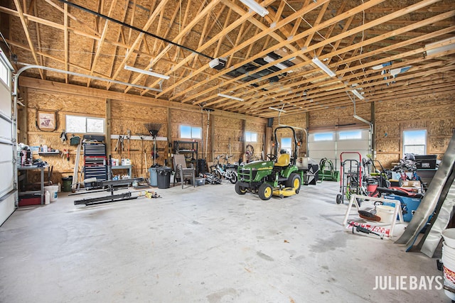12828 Bayou Ct, Wayland, MI 49348 - garage with a workshop area
