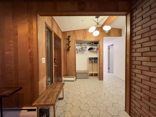 3431 Pineview Dr, Dexter, MI 48130 - corridor featuring baseboard heating, wood walls, light flooring, vaulted ceiling, and a chandelier