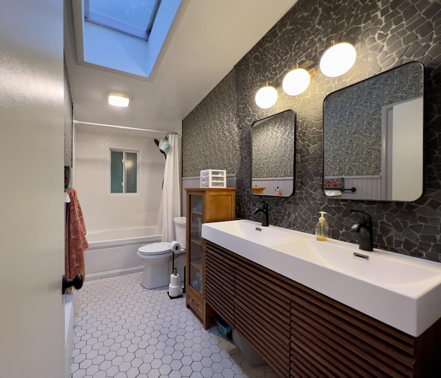 3431 Pineview Dr, Dexter, MI 48130 - bathroom with a skylight, shower / tub combo, and double vanity