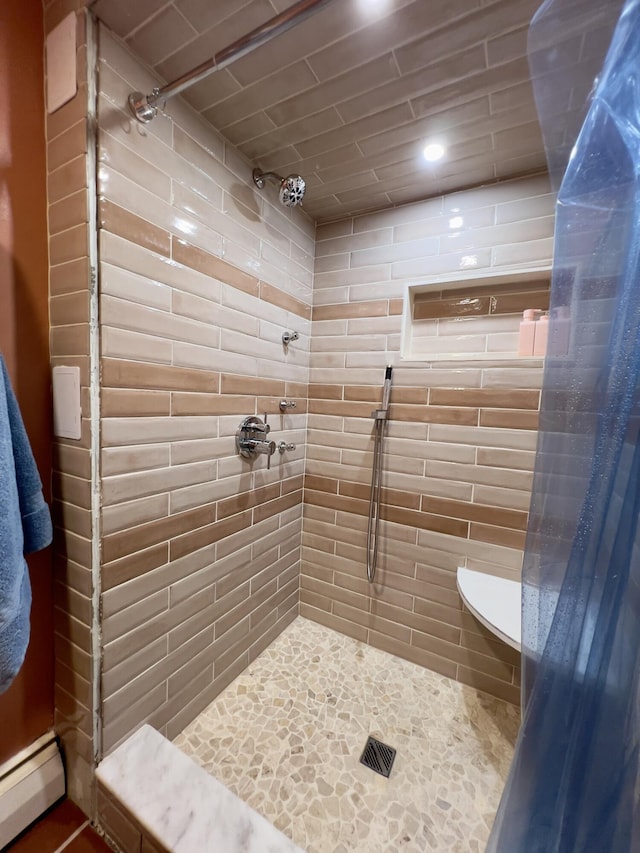 3431 Pineview Dr, Dexter, MI 48130 - full bath featuring a baseboard heating unit and a tile shower