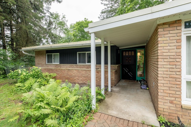 3431 Pineview Dr, Dexter, MI 48130 - view of exterior entry with brick siding