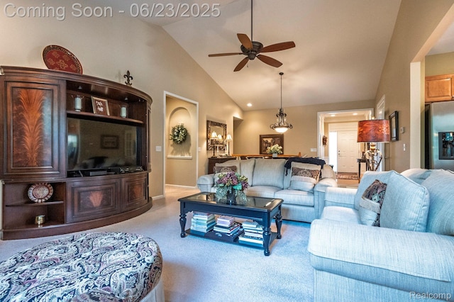 601 Acadia Ct, Howell, MI 48843 - living area featuring a ceiling fan, carpet floors, and high vaulted ceiling