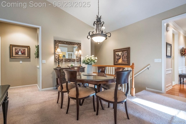 601 Acadia Ct, Howell, MI 48843 - dining space with light colored carpet and vaulted ceiling