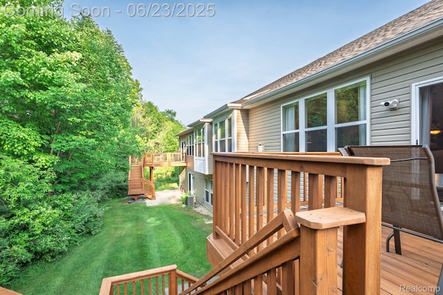 601 Acadia Ct, Howell, MI 48843 - view of green lawn featuring a deck