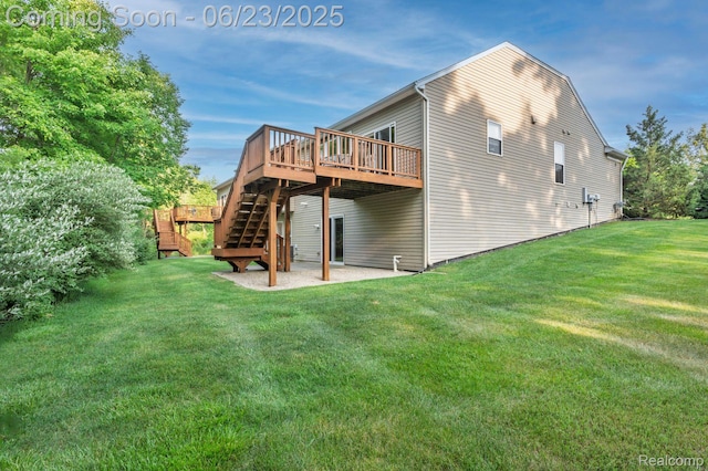 601 Acadia Ct, Howell, MI 48843 - rear view of property with a deck, stairway, a yard, and a patio