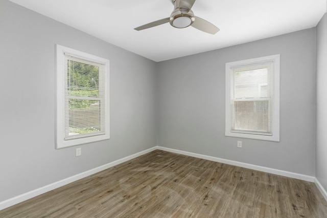 11706 Auburn St, Detroit, MI 48228 - unfurnished room featuring wood finished floors and a ceiling fan