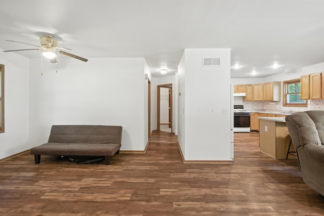 26434 King Rd, Romulus, MI 48174 - sitting room with dark wood finished floors and ceiling fan