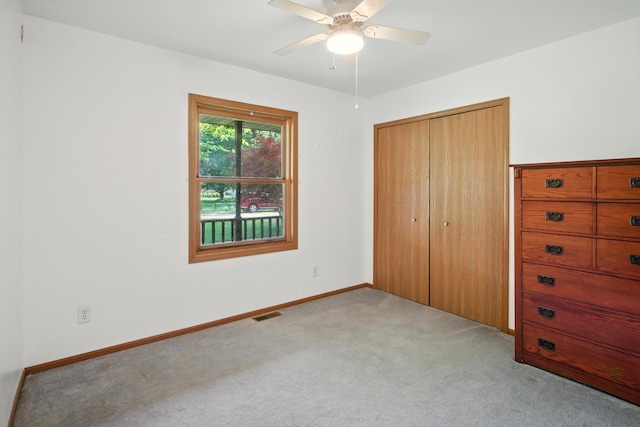 26434 King Rd, Romulus, MI 48174 - unfurnished bedroom with carpet, a closet, and ceiling fan