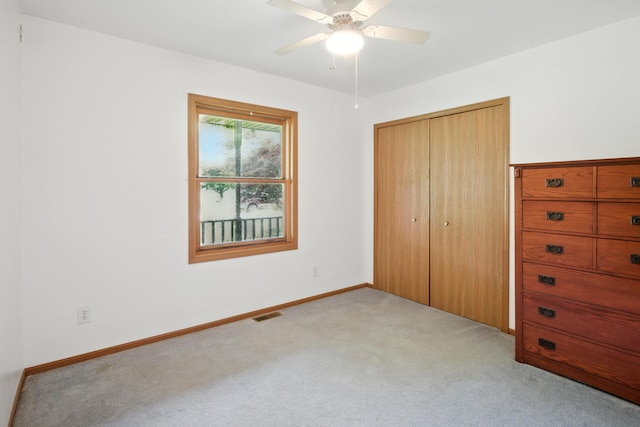 26434 King Rd, Romulus, MI 48174 - unfurnished bedroom featuring carpet floors, a closet, and a ceiling fan