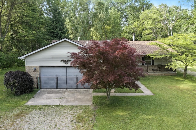 26434 King Rd, Romulus, MI 48174 - view of front of house with a front lawn and brick siding