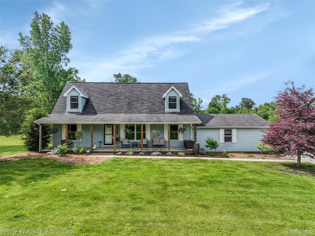 26855 King Rd, Brownstown, MI 48174 - view of front of property with covered porch and a front lawn