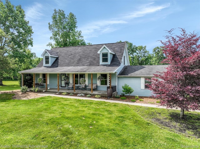 26855 King Rd, Brownstown, MI 48174 - view of front of house featuring a porch and a front yard