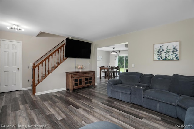 26855 King Rd, Brownstown, MI 48174 - living area featuring stairway and dark wood-style flooring