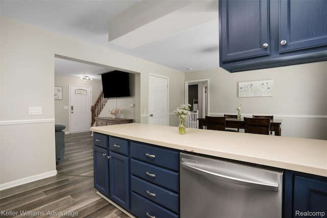 26855 King Rd, Brownstown, MI 48174 - kitchen featuring blue cabinetry, dishwasher, dark wood finished floors, and light countertops