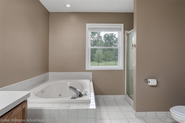26855 King Rd, Brownstown, MI 48174 - full bathroom with a tub with jets, vanity, a stall shower, and tile patterned floors