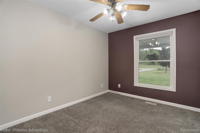 26855 King Rd, Brownstown, MI 48174 - carpeted spare room featuring baseboards and a ceiling fan