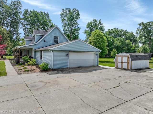 26855 King Rd, Brownstown, MI 48174 - view of property exterior featuring a storage unit and a porch