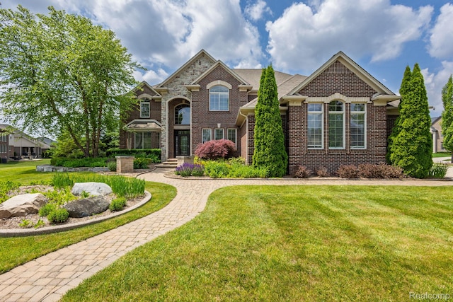56343 Via Serbelloni, Macomb, MI 48042 - view of front of house with brick siding and a front yard