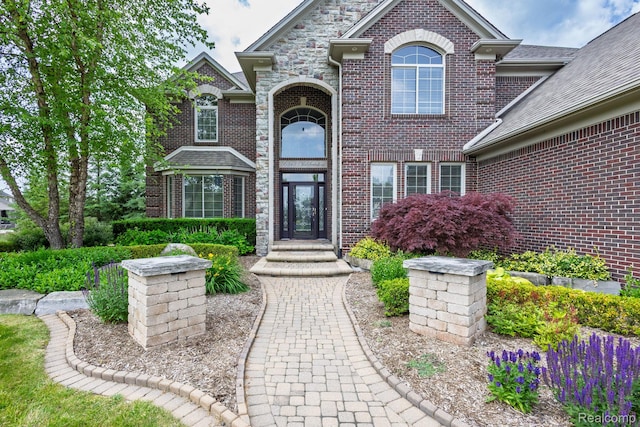 56343 Via Serbelloni, Macomb, MI 48042 - property entrance featuring brick siding