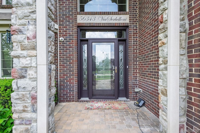 56343 Via Serbelloni, Macomb, MI 48042 - view of exterior entry with brick siding