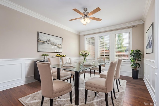 56343 Via Serbelloni, Macomb, MI 48042 - dining room with crown molding, dark wood-style floors, a decorative wall, a ceiling fan, and a wainscoted wall