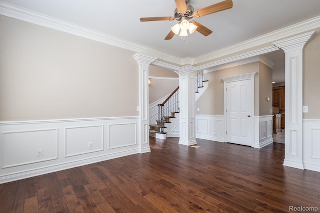 56343 Via Serbelloni, Macomb, MI 48042 - spare room featuring decorative columns, a ceiling fan, stairs, ornamental molding, and dark wood-type flooring