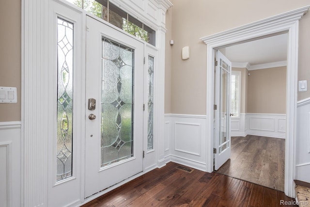 56343 Via Serbelloni, Macomb, MI 48042 - entrance foyer featuring dark wood-style flooring, wainscoting, a decorative wall, and crown molding