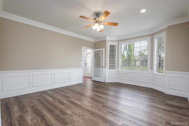 56343 Via Serbelloni, Macomb, MI 48042 - spare room featuring ceiling fan, ornamental molding, a decorative wall, wainscoting, and dark wood finished floors