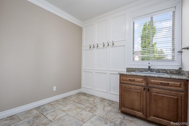 56343 Via Serbelloni, Macomb, MI 48042 - kitchen with white cabinetry, crown molding, light stone finish floors, and stone countertops
