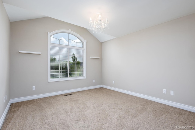 56343 Via Serbelloni, Macomb, MI 48042 - spare room with a chandelier, carpet, and vaulted ceiling