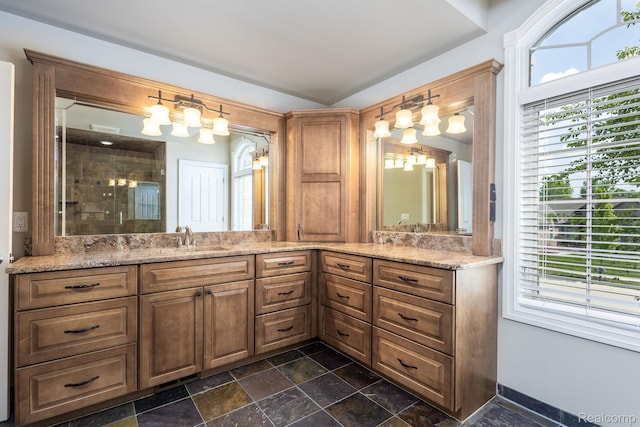 56343 Via Serbelloni, Macomb, MI 48042 - full bathroom with a shower stall, vanity, and stone finish flooring