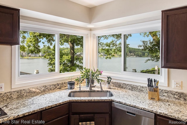 7025 Dandison Blvd, West Bloomfield, MI 48324 - kitchen featuring stainless steel dishwasher, dark brown cabinets, and healthy amount of natural light