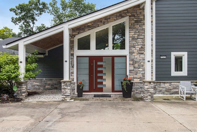 7025 Dandison Blvd, West Bloomfield, MI 48324 - view of exterior entry with stone siding