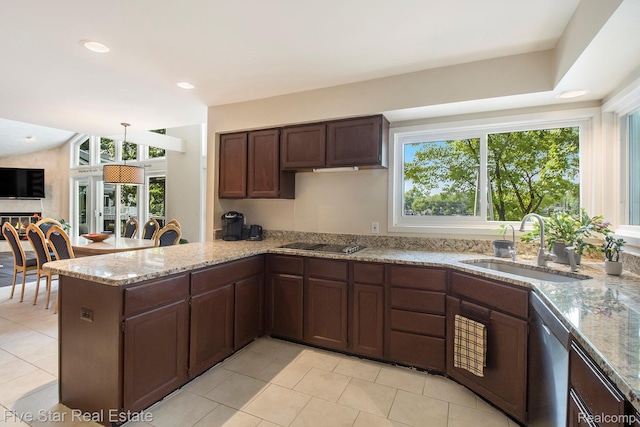 7025 Dandison Blvd, West Bloomfield, MI 48324 - kitchen with stainless steel dishwasher, plenty of natural light, black electric stovetop, a peninsula, and recessed lighting
