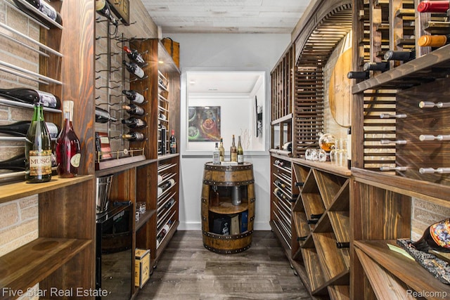 7025 Dandison Blvd, West Bloomfield, MI 48324 - wine room with wood finished floors and baseboards
