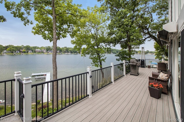 7025 Dandison Blvd, West Bloomfield, MI 48324 - wooden deck with a water view and a grill