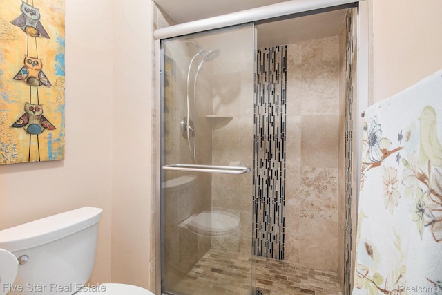 7025 Dandison Blvd, West Bloomfield, MI 48324 - bathroom with toilet and a stall shower