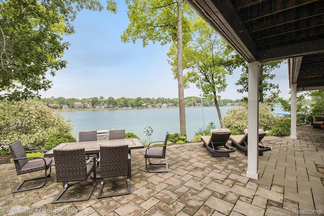 7025 Dandison Blvd, West Bloomfield, MI 48324 - view of patio / terrace featuring a water view and outdoor dining area